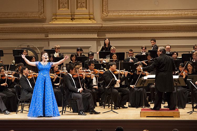 Soprano Geng Haolan performs with the Shen Yun Symphony Orchestra Sunday