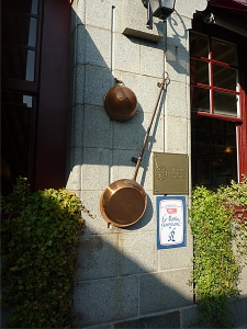 Entrance to Mere Poulard skillet, home to one of the world&rsquo;s most expensive omelets (Annie Li).