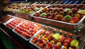 Syrup-coated fruit sticks&mdash;another skewered (but not grilled) delicacy.