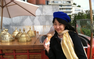 There she is, enjoying two of her favorite things on earth: ice cream and berets. And travel. Three favorite things.