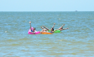 Come in the water! In the photo, from left: dancers Erin Battrick, Vicki Cao, and Stephanie Guo. (photo by Seron Guang Ling Chau)