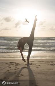 Dancer Emily Pan performs a classical Chinese dance move called 