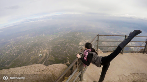 Outside Barcelona, Shen Yun International Company peaked at the view from Montserrat mountain. Dancer: Chunqiao Cai. (photo by projectionist Annie Li)
