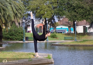 Principal Dancer Kaidi Wu performs a technique known as “looking into the water.” 
