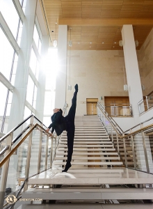 Principal Dancer Rubi Zhang, who has been wowing audience members with his jump splits, warms up in Madison. (Photo by Jeff Chuang)
