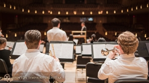 Trumpet players Kaspar Martig (L) and Jimmy Geiger stay behind after rehearsal for more practice. 
