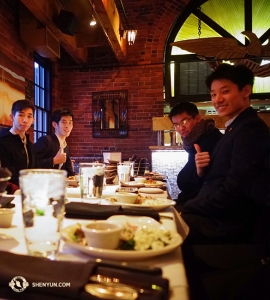 Meanwhile, the Shen Yun World Company visits Boston. Between shows, dancers Joe Huang, Rui Suzuki, Chad Chen and Rubi Cho (L to R) enjoy a delicious New Year's Eve dinner at Boston’s waterfront restaurant, Chart House. (Photo taken by Leo Lee)
