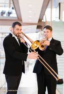 Trombonist Alexandru Moraru and trumpeter Vladimir Zemtsov use the open space in the lobby to practice.
