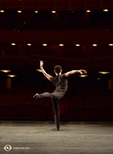 After enjoying the cherry blossoms, Principal Dancer Xinghao Che uses the stage of the Kennedy Center Opera House to warm up. (Photo by Edwin Fu)
