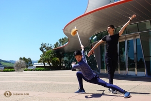 Dancers Leo Yin and Bill Xiong get into character before one of two shows in San Luis Obispo. (Photo by Jeff Chuang)
