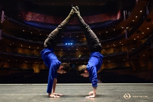 It's time to prepare for the performance. Dancers Johnny Cao and Allen Li help each other to balance their handstands on the stage of Conjunto de Artes Theater in Guadalajara, Mexico, where we are scheduled to hold four sold-out performances. (Photo by Edwin Fu)
