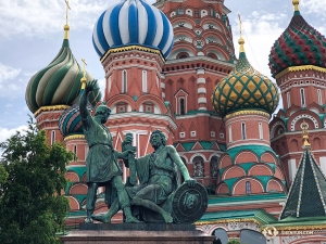 The Monument to Minin and Pozharsky outside St. Basil's Cathedral in Moscow. This statue commemorates a merchant and a prince who gathered a volunteer Russian army to defend the country from invading Polish forces in the early 1600s. 