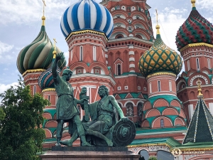 The Monument to Minin and Pozharsky outside St. Basil's Cathedral in Moscow. This statue commemorates a merchant and a prince who gathered a volunteer Russian army to defend the country from invading Polish forces in the early 1600s. 
