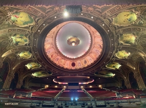 Now jumping to the Wang Theatre in Boston, MA, Principal Dancer Angelia Wang captures a shot of the majestic ceiling murals before a performance.
