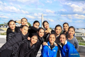 Taken on their final day in Washington, D.C, Shen Yun North America Company dancers pose between two shows, with the Washington Monument in the background.
