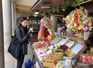 Principal Dancer Michelle Lian checks out the local handmade crafts at London's Covent Garden market. 
