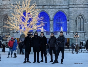 Dressed for the weather, dancers pose together in front of the well-known church located in the historic district of Old Montreal.

(Photo by dancer Ben Chen) 