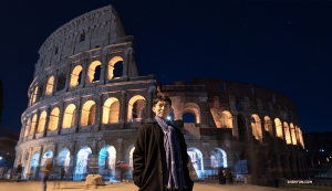 Exploring Rome by moonlight, dancer Kim Jisung takes a moment to pose in front of the Colosseum.

(Photo by Andrew Fung) 