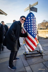 Dancer Jared Ren spots something familiar in London. (Photo by Tony Xue)