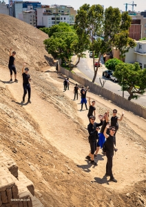 The group heads back to regular city buildings after exploring the pyramid located right in the middle of Lima. (Photo by Tony Xue)