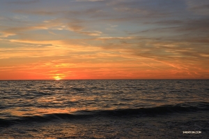 O sol se põe no Golfo do México. (Foto de Nick Zhao)