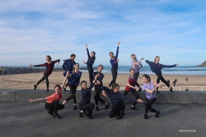 Now for the girls' turn to pose outside the theatre in Spain's San Sebastian, which is right next to the beach!