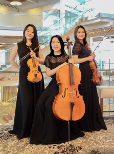 From left, Kexin Zhou, Yuting Li, and Wenhui Tan at Dr. Phillips Center for the Arts in Orlando.