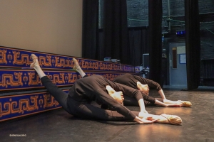 Stretching is of course another key part of performance prep! Dancers Sophie Shao and Anna Wang work on their oversplits.