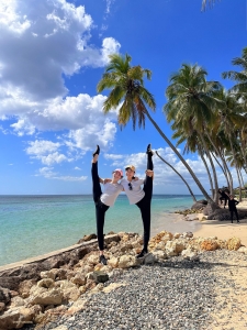 Dancers Miranda Zhou-Galati and Cecilia Wang head straight to the beach to have a leg up on the rest of the group.