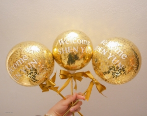 As our tour takes us to Brazil, we are welcomed by the warm and cheerful locals, who greet us with cute golden balloons, symbolic of their contagious joy.