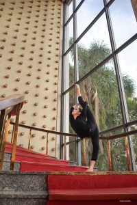 The back-leg hold is a hallmark of female classical Chinese dancers, and Anna Wang demonstrates her mastery of this move with exceptional poise.