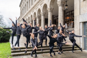 Dancers pose in front of the Mulheim an Der Ruhr theatre in Germany.