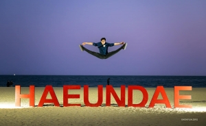 After dark, as other beachgoers head home, our performers are still full of energy.