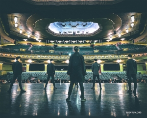 It's almost showtime—performers get their bearings onstage and in the orchestra pit at the Eventim Apollo in London.