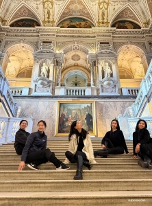 Inside the museum, the grand interior staircase offers respite—and a photo op—between explorations.